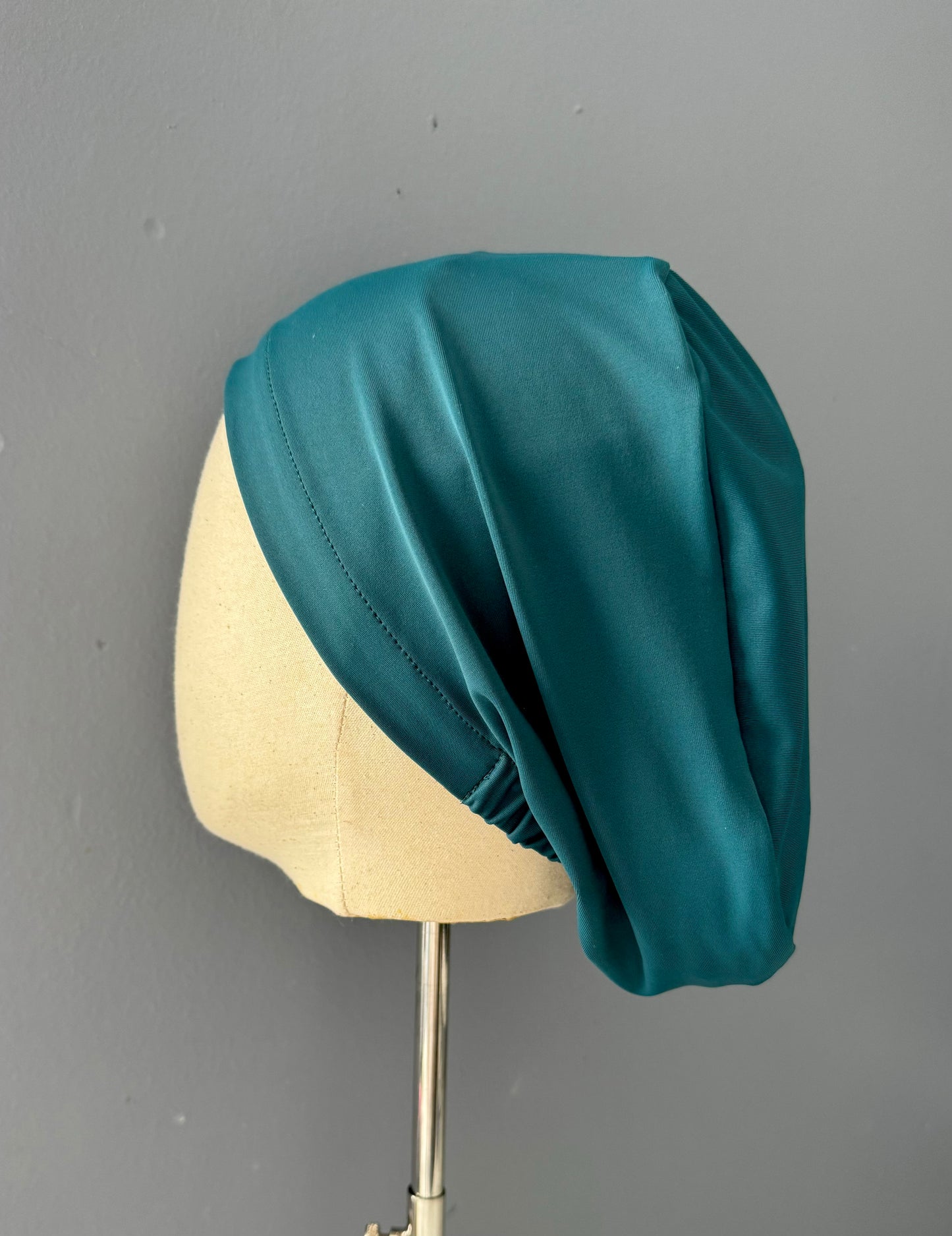 Cofia color verde oscuro