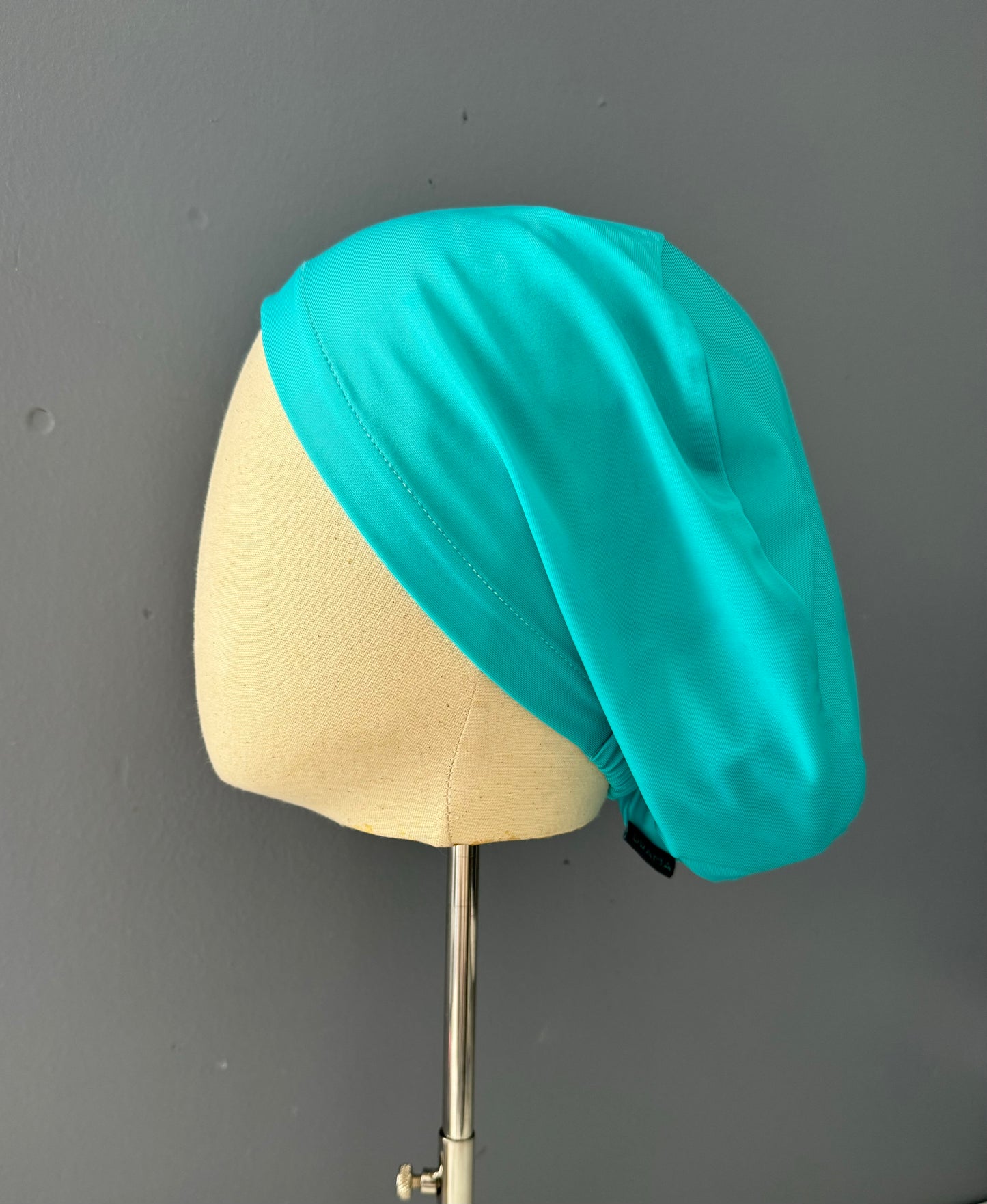 Cofia color turquesa