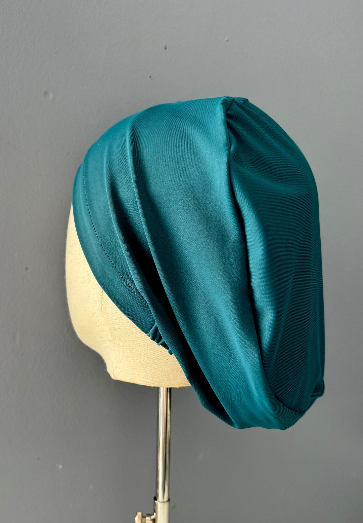 Cofia color verde oscuro